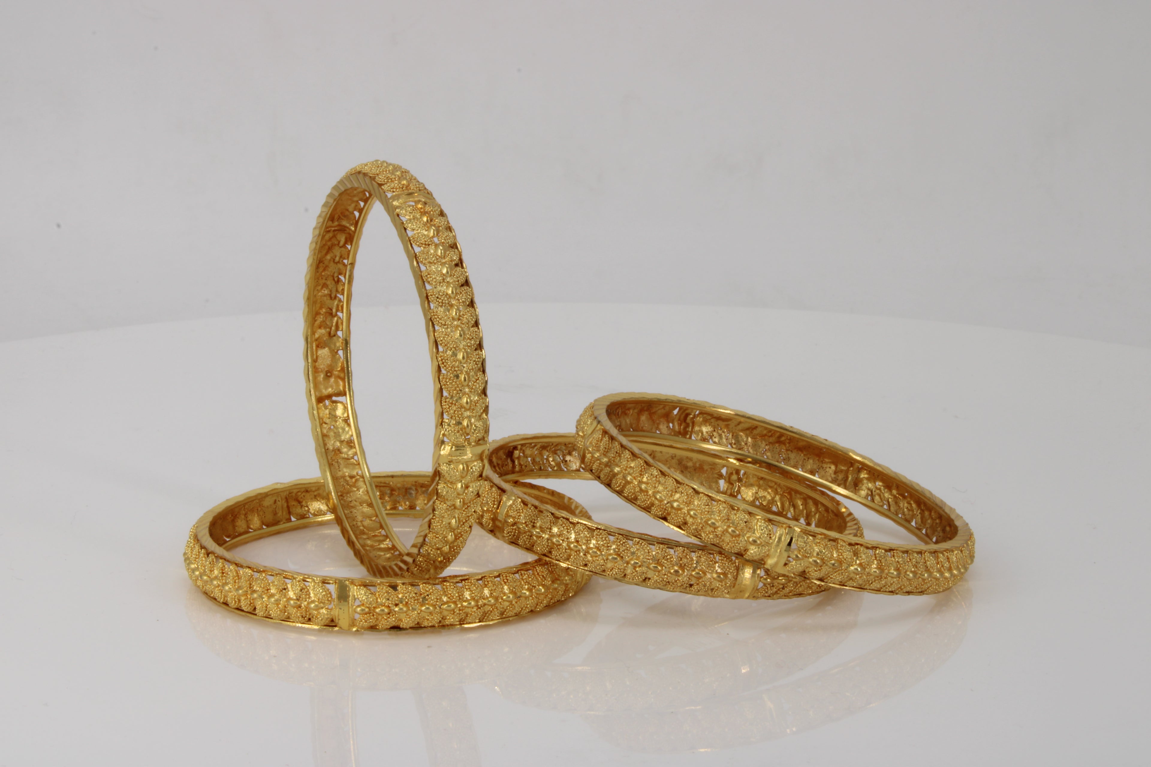 Intricately Designed Gold Bangles: