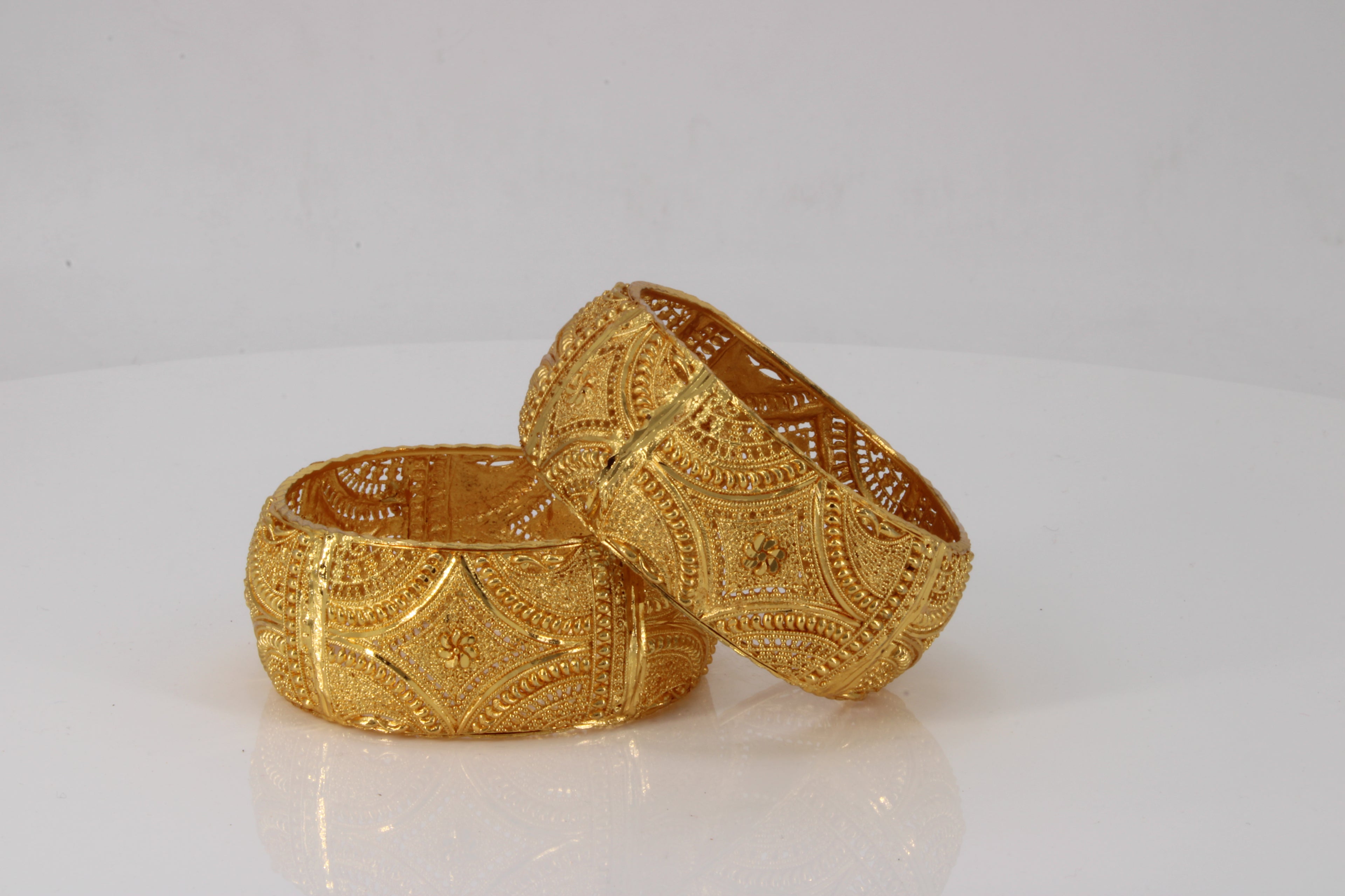 Broad gold kada bangles