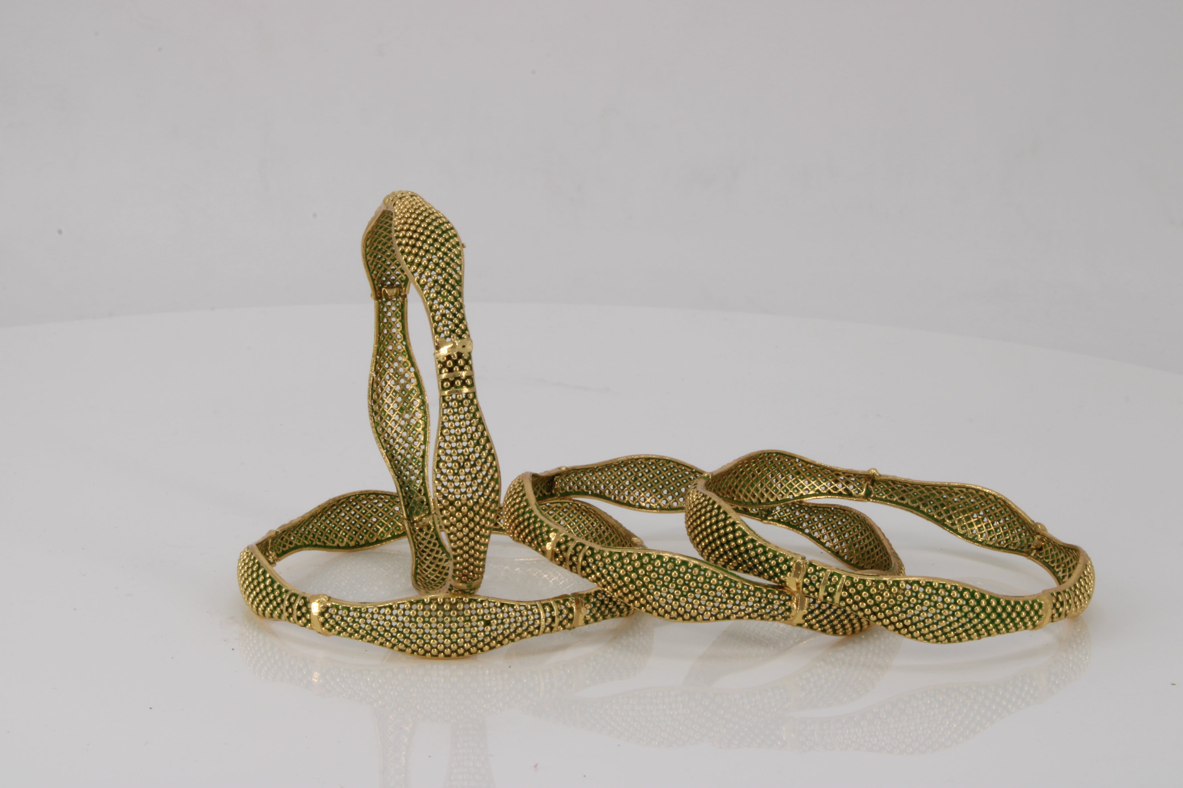 Emerald Ripple Cuffs