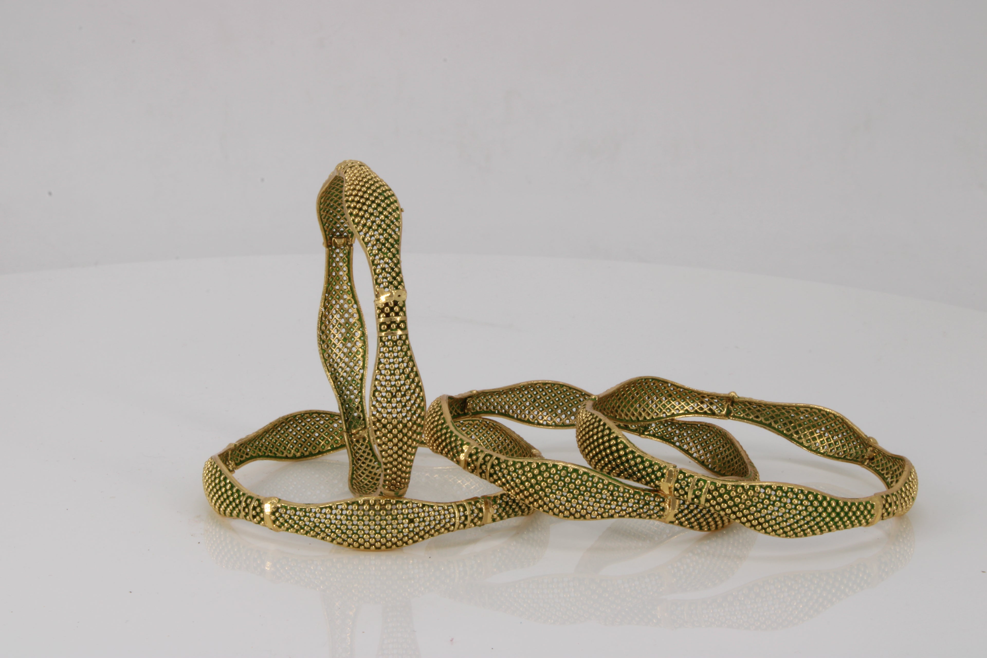 Emerald Ripple Cuffs