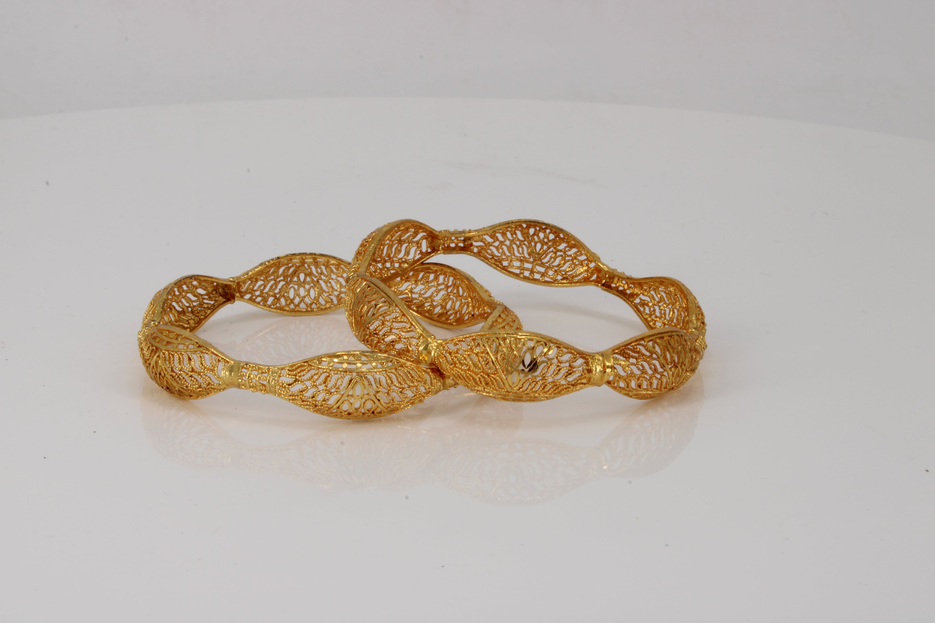 Golden Helix Bangles