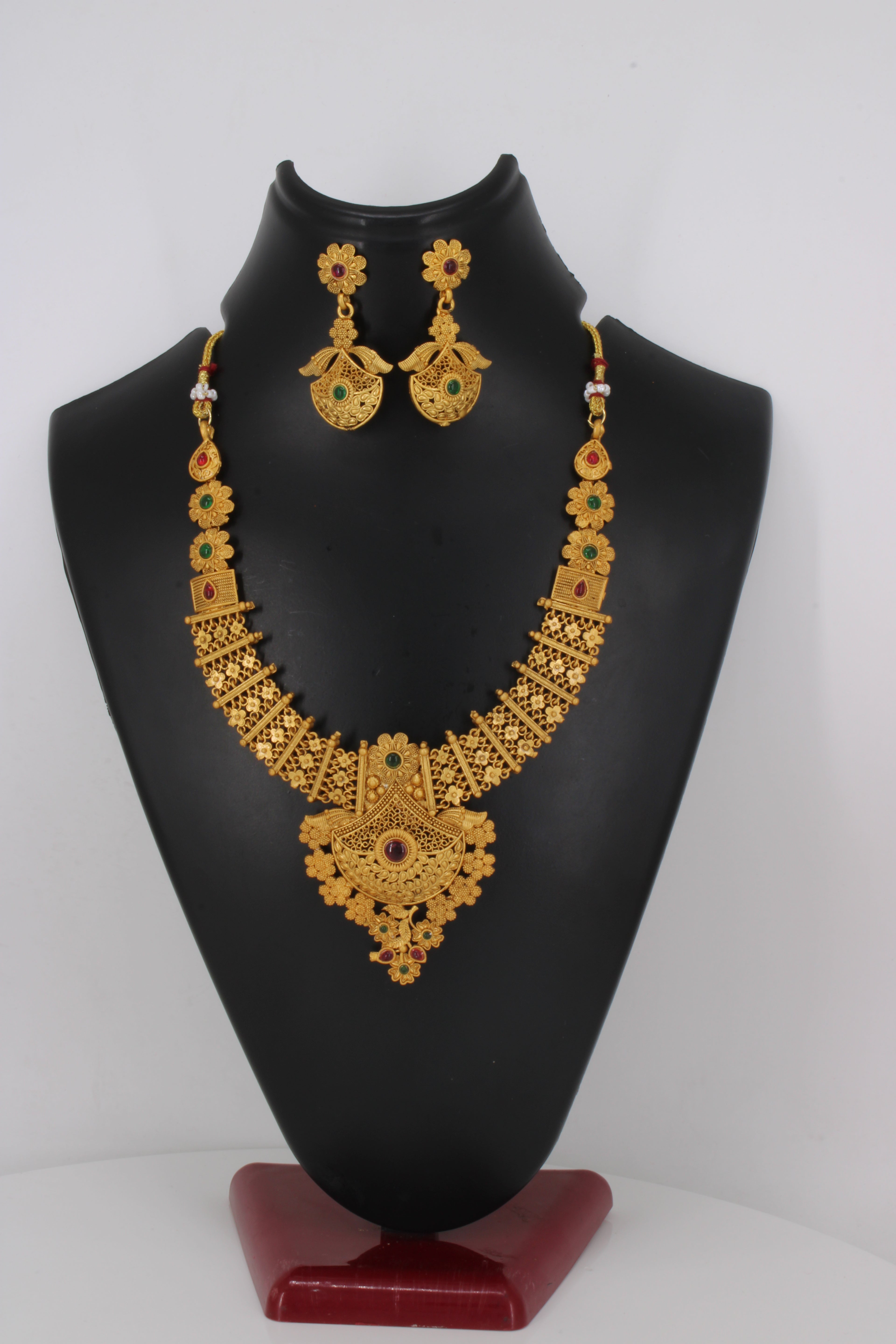 Intricately Carved Gold-Tone Set